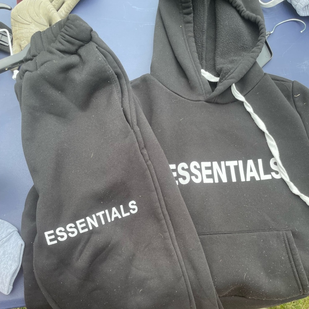 Essentials Black Hoodie with Minimalist Design